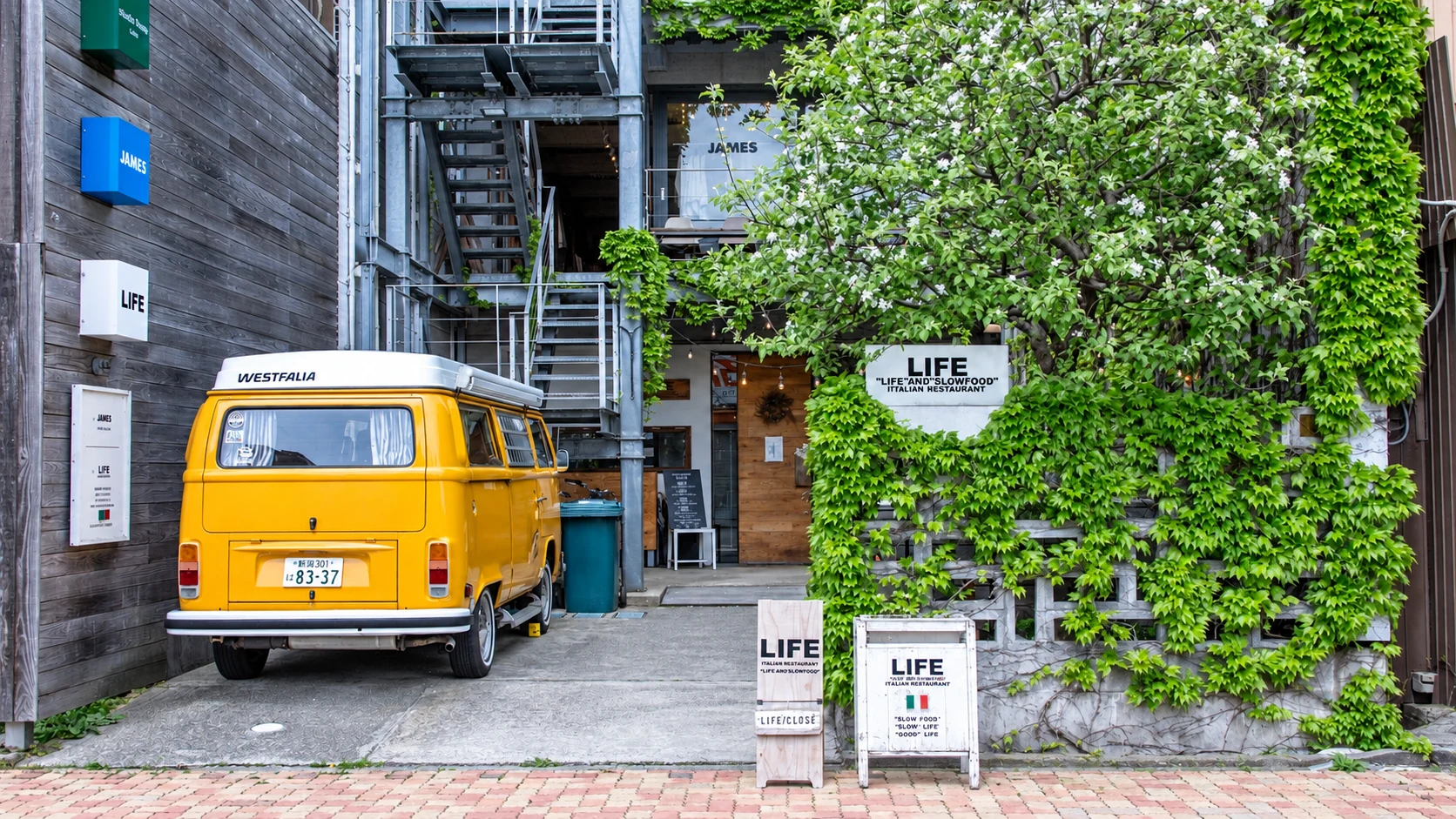 E-YADO Niigata Furumachi alley and the signature yellow van